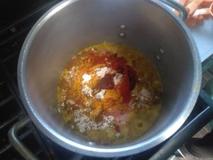 mixing powders in a cooking pot